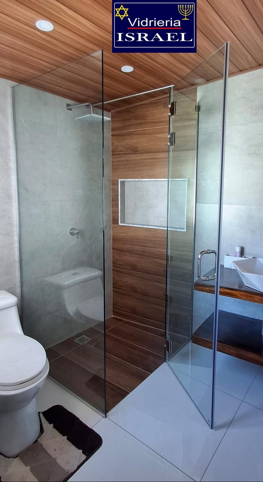 modulo de puerta corrediza  aluminio bronce y vidrio bronce liso con vidrio fijo lateral y vidrio fijo superior de   2.86 X 2.95